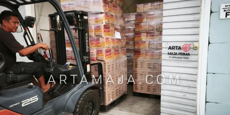 Forklift moving pallets of noodles in our warehouse