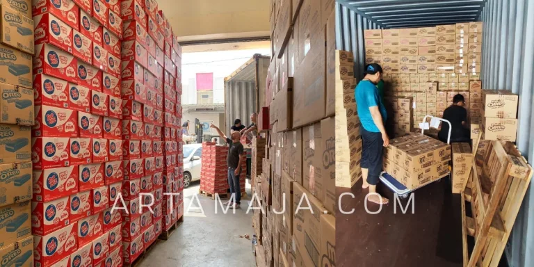 Loading cartons into a container at our warehouse